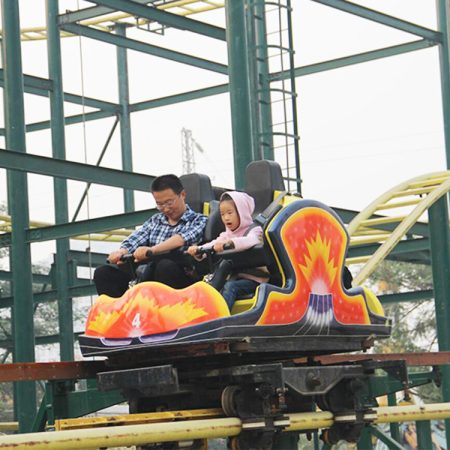 Spin roller coaster ride